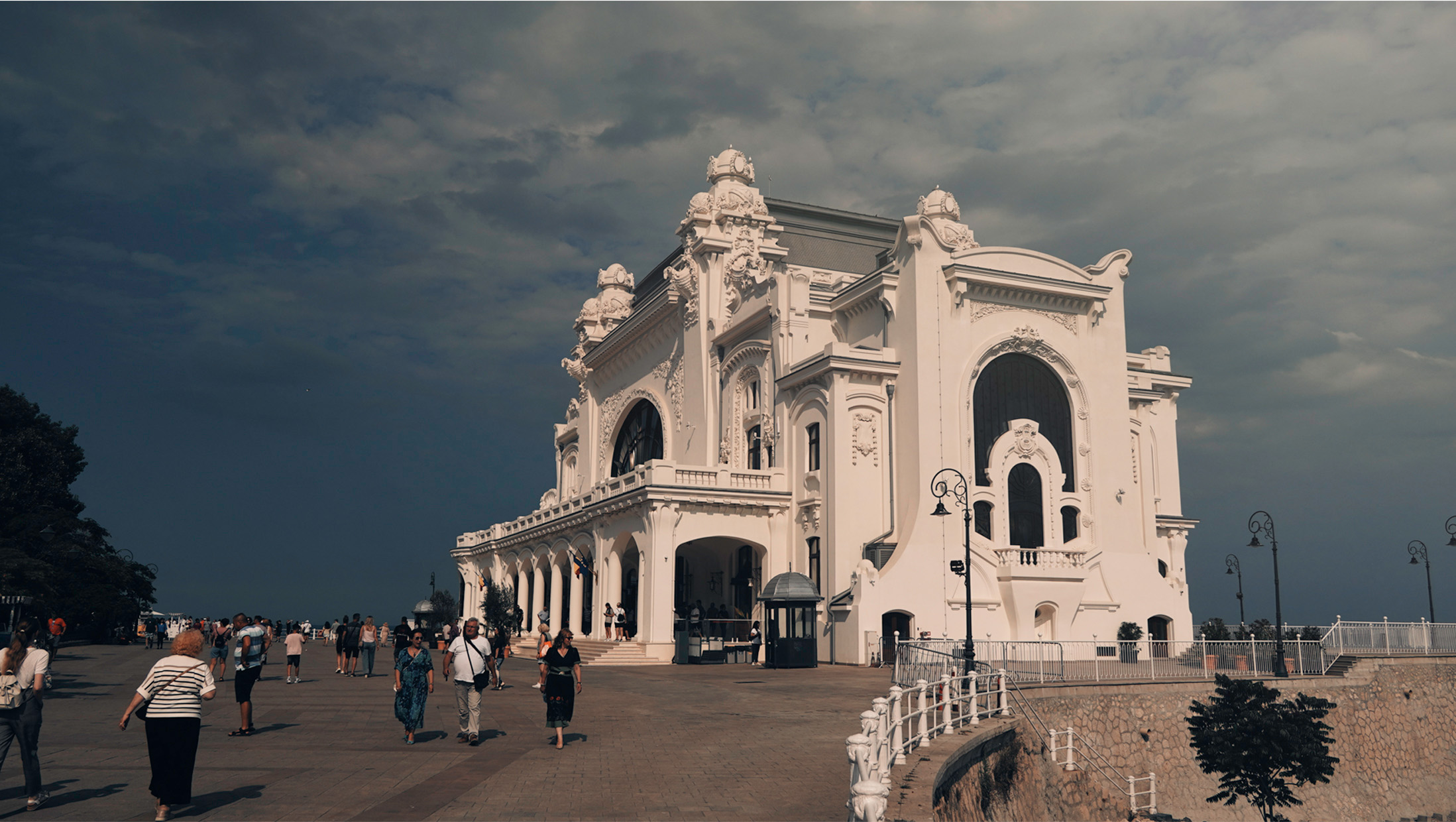 People walking around the Constanța Casino