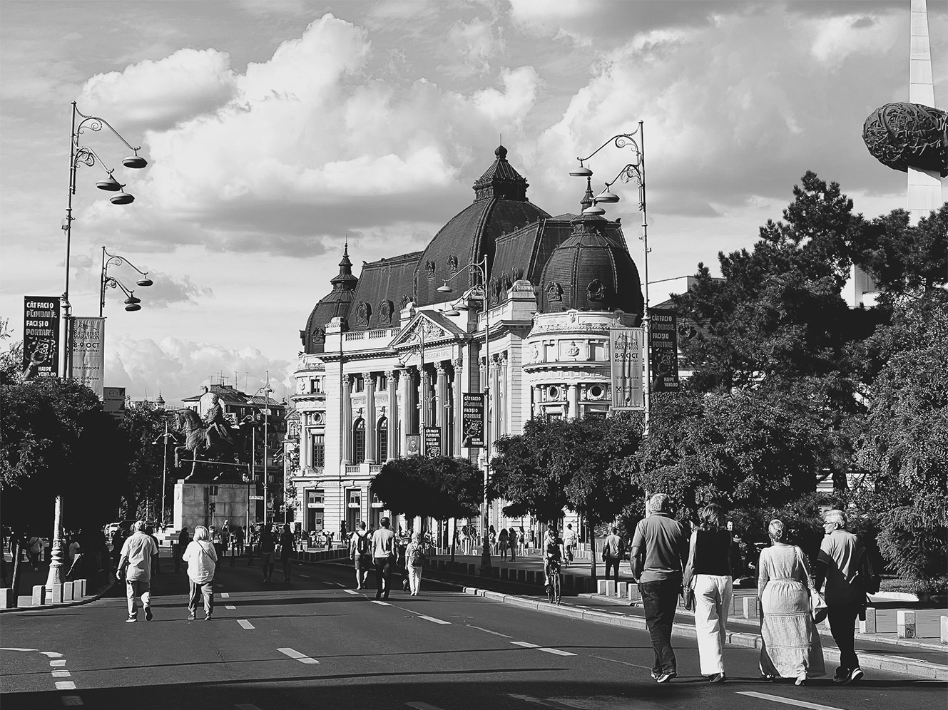 Romanian Athenaeum and pedestrians on Calea Victoriei